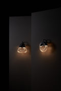 The Crescent Arc Sconce